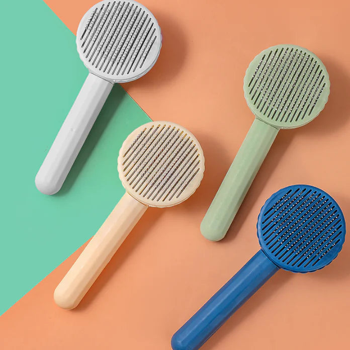 Glida self-cleaning pet grooming brush
